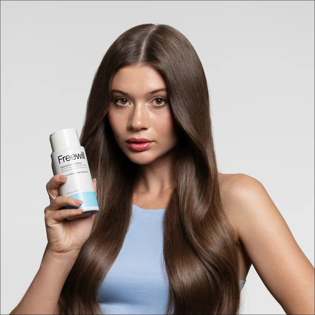 A single green leaf against a white background.